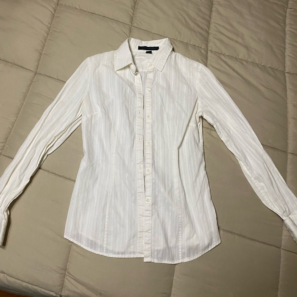 Express long sleeve button up top